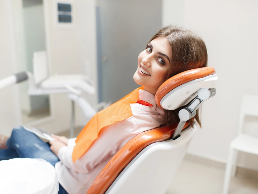 A relaxed patient smiling in the dental chair