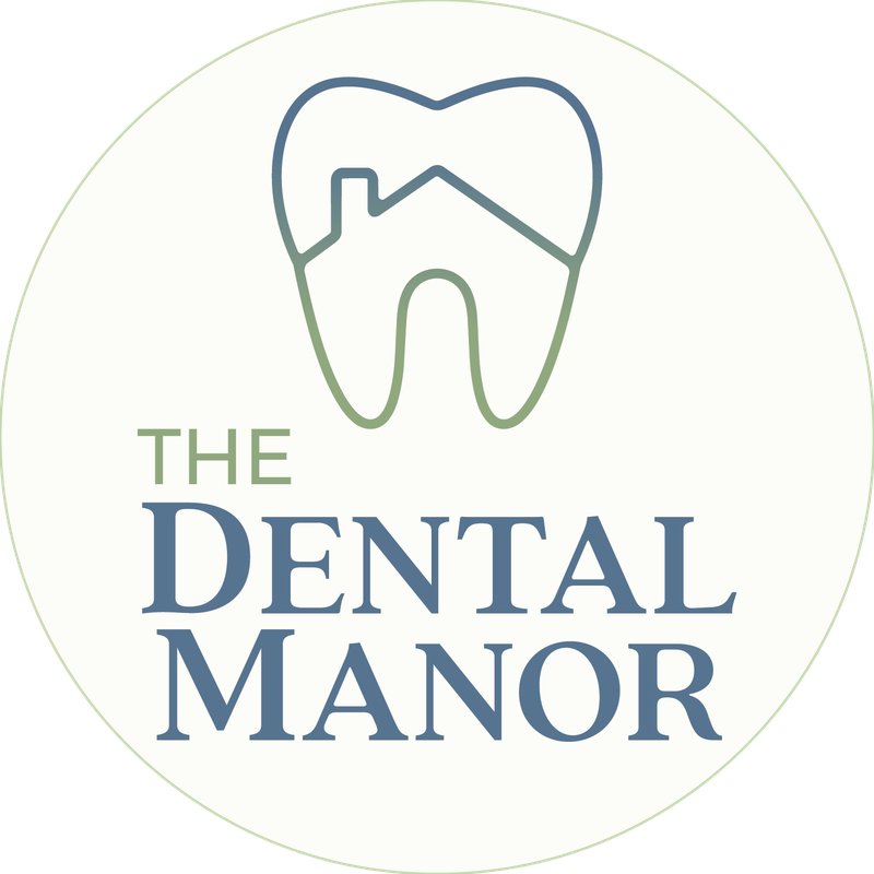 The Dental Manor logo